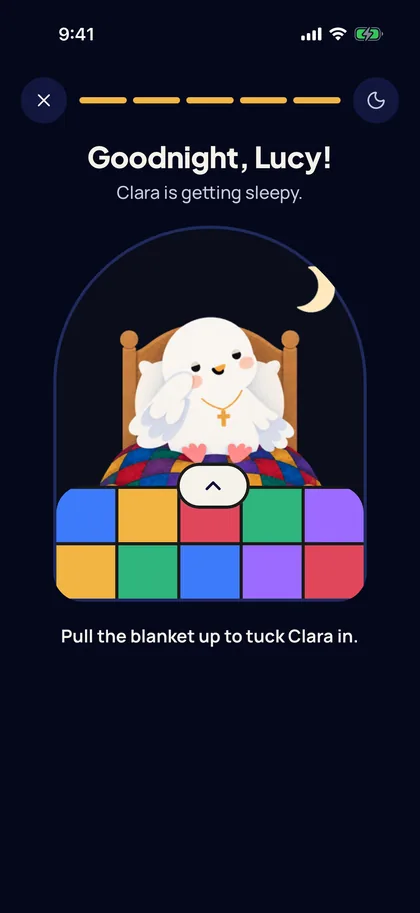Clara in bed, ready to be tucked in